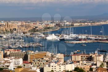 View of the port with yachts and the city of Palma De Mallorca