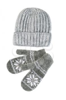 Knitted gloves and hat set. Isolate on white.