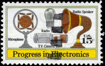 Royalty Free Photo of 1973 US Stamps Shows the Microphone, Speaker, Vacuum Tube, TV Camera Tube, Electronics Progress