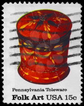Royalty Free Photo of 1979 US Stamp Shows the Sugar Bowl, Pennsylvania Toleware