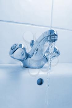 Royalty Free Photo of a Running Faucet