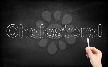 Cholesterol written on white blackboard