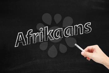 The language of Afrikaans written on a blackboard