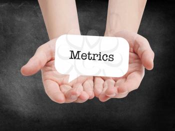 Metrics written on a speechbubble