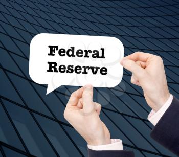 Federal Reserve written in a speechbubble