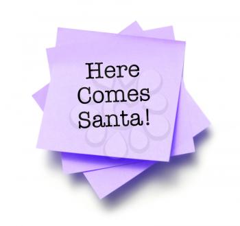 Here Comes Santa written on a note