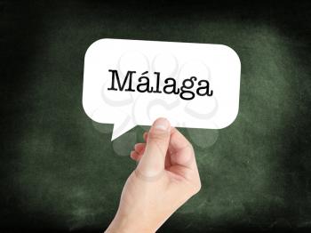 Málaga  written in a speech bubble