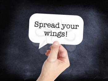 Spread your wings written on a speechbubble