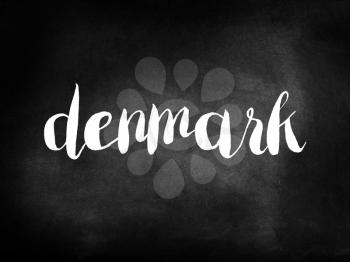 Denmark written on a blackboard