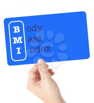 Body Mass Index explained on a card held by a hand