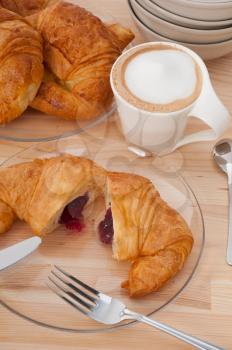 fresh croissant french brioche and coffee typical traditional Italian breakfast