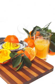 making fresh orange juice over white