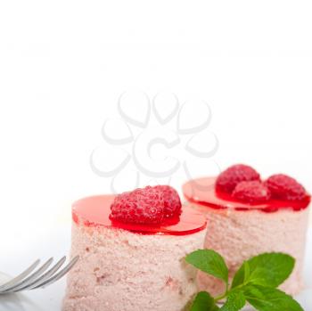 fresh raspberry cake mousse dessert round shape with mint leaves