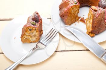 fresh chestnut cake bread dessert with almonds and pistachios on top