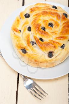 fresh home baked blueberry bread cake dessert over white wood table