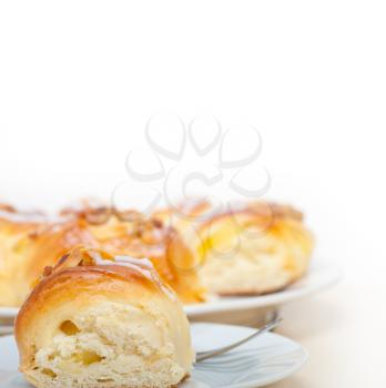 fresh home baked sweet bread donut cake with almonds and icing sugar on top