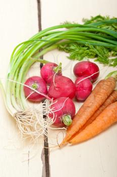 raw root vegetable on a rustic white wood table