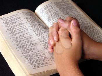 Royalty Free Photo of a Person Praying