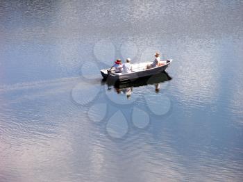 Royalty Free Photo of People in a Boat