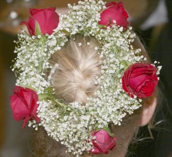 Royalty Free Photo of Flowers in a Girl's Hair