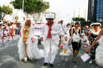 Royalty Free Photo of People Wearing Costumes in a Parade