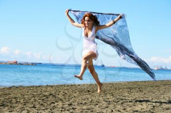 Royalty Free Photo of a Woman at the Beach