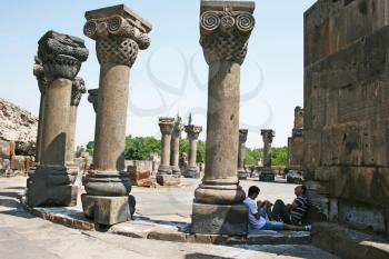 Royalty Free Photo of People at the Zvartnots Cathedral Ruins in Armenia