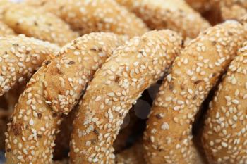 Round rusks with sesame seeads, closeup picture.