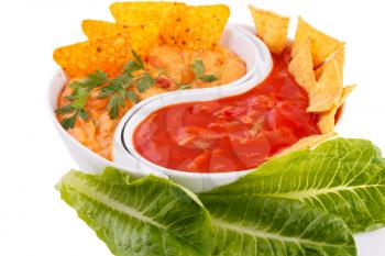 Nachos,  cheese and red sauce, vegetables isolated on white background.