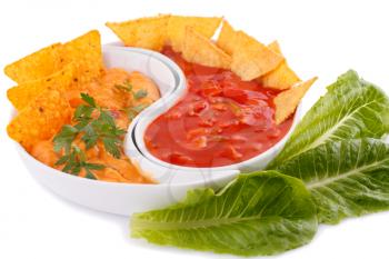 Nachos,  cheese and red sauce, vegetables isolated on white background.