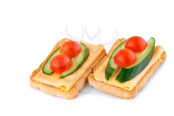Rusk sandwiches with tomato, cucumber and cheese  isolated on white background.