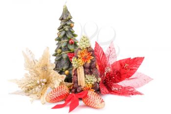 Fir tree candles, cones, flowers and red ribbon isolated on white background.
