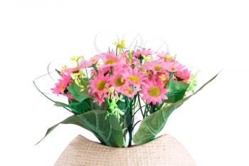 Pink fabric flowers in vase isolated on white background.