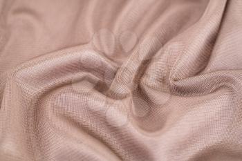 Brown silk fabric for background.