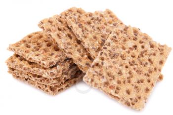 Pile of crackers with sesame seeds isolated on white background.