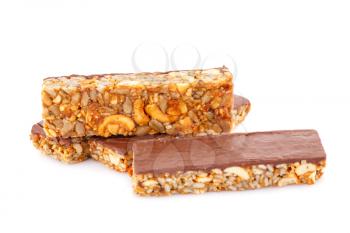 Muesli bars with different nuts and seeds isolated on white background.