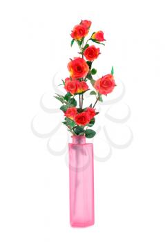 Red fabric roses  in glass vase isolated on white background.