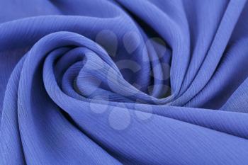 Violet fabric as a background.