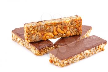 Muesli bars with different nuts and seeds isolated on white background.