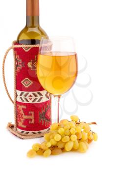 Wine and grapes isolated on white background.