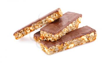 Muesli bars with different nuts and seeds isolated on white background.