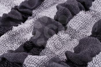 Black and white fabric background closeup picture.