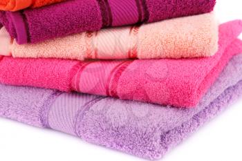 Colorful towels stack closeup picture.