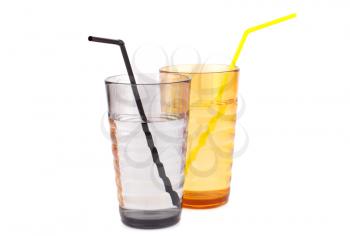 Plastic glasses with water and straw isolated on white background.
