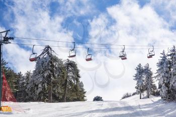 People at ski lift resort on Troodos mountain range, Cyprus.