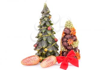 Fir tree candles, cones and red ribbon isolated on white background.