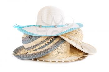 Colorful summer hats isolated on white background.