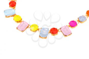 Stylish necklace with colorful stones isolated on white background.
