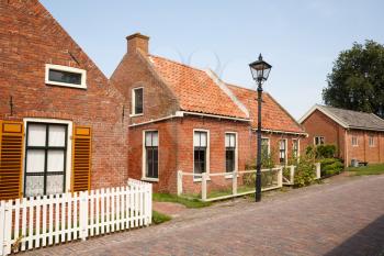 The houses in the traditional old fisherman village open-air museum of Zuiderzee (Zuiderzeemuseum), Enkhuizen, Netherlands.