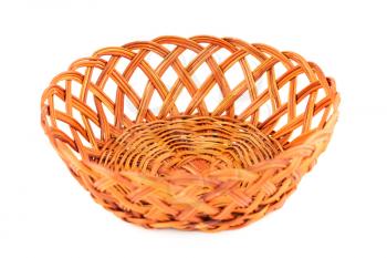 The empty wicker basket isolated on white background.